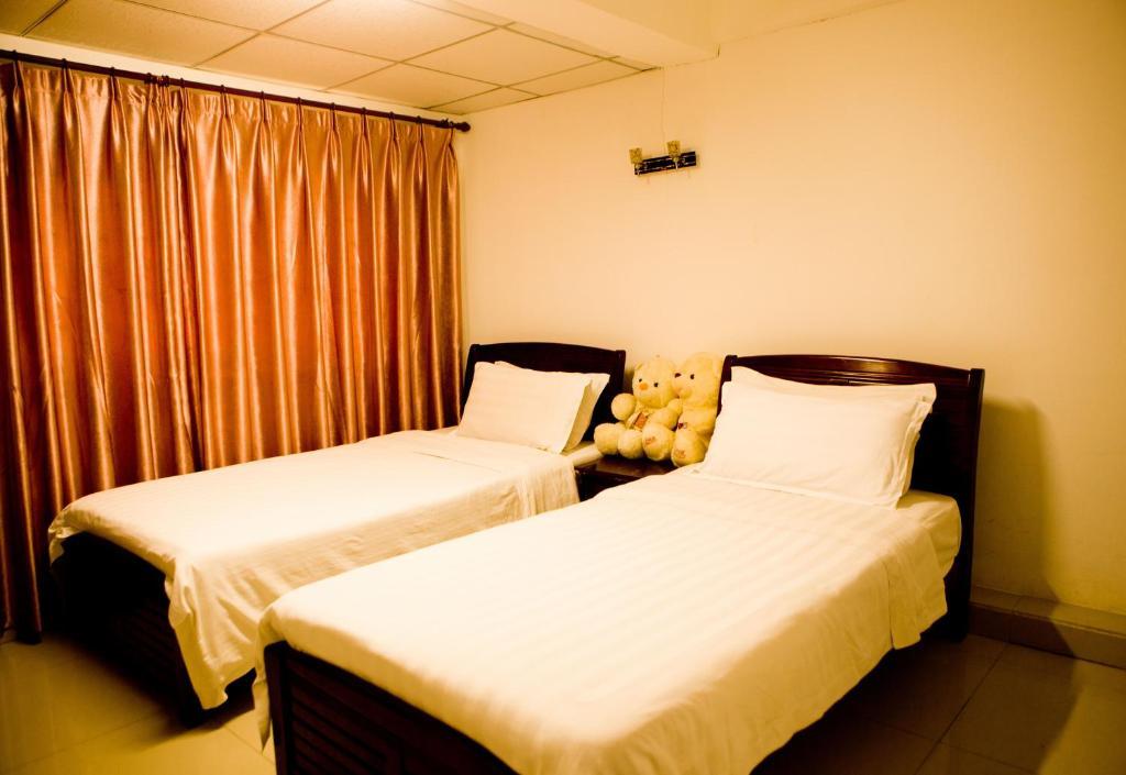 Sanya Hairulan Hotel Habitación foto